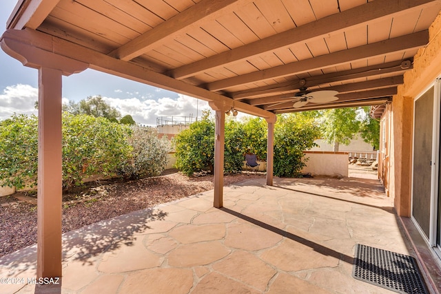 view of patio featuring ceiling fan