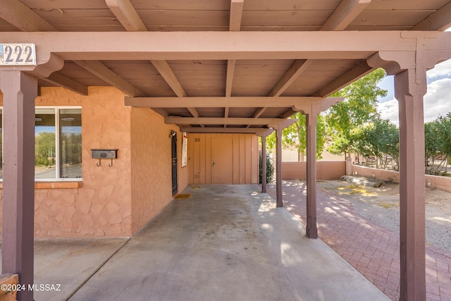 view of patio with a carport