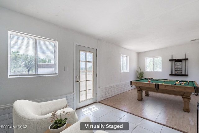 game room featuring billiards and light hardwood / wood-style flooring