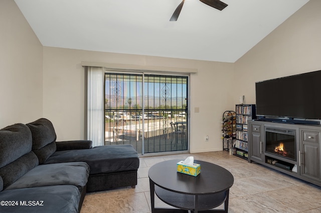 living room with vaulted ceiling and ceiling fan