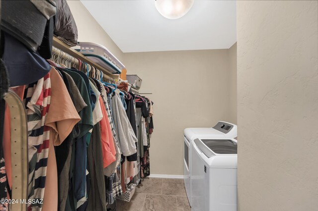 spacious closet with separate washer and dryer