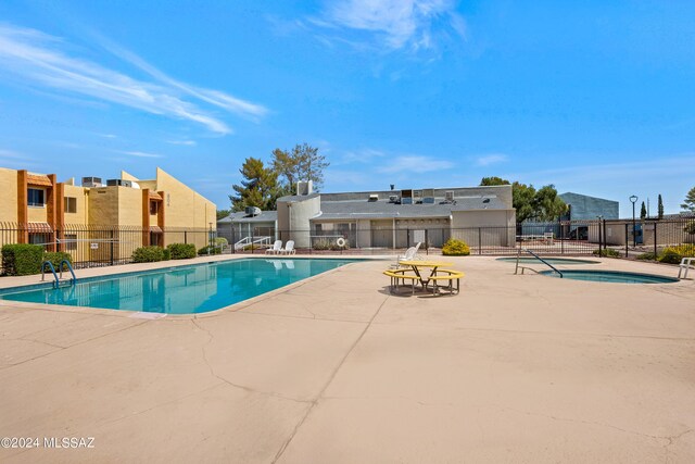 view of swimming pool featuring a patio