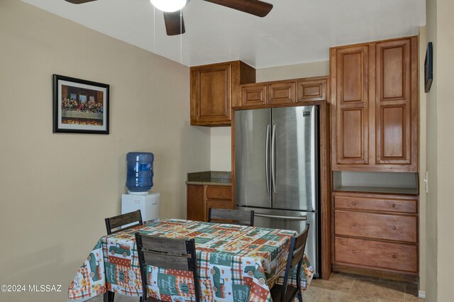 kitchen with stainless steel fridge and ceiling fan