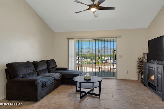 living room featuring lofted ceiling and ceiling fan