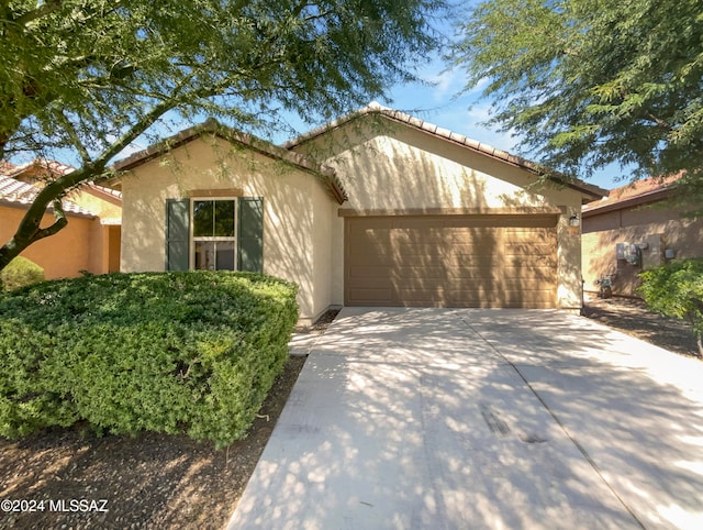 view of front of house with a garage