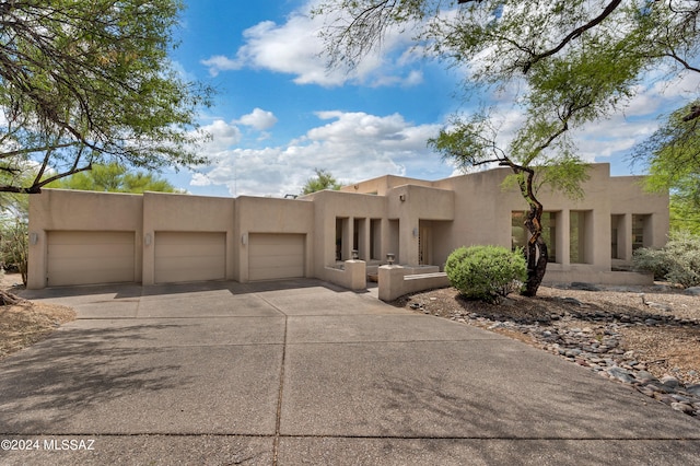 adobe home with a garage