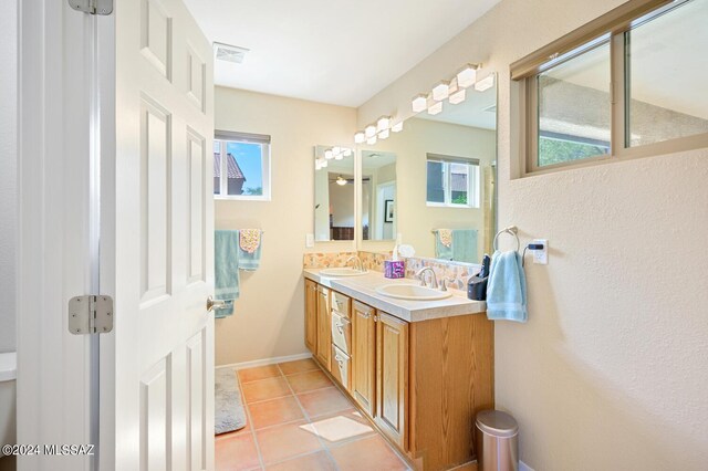 bathroom featuring vanity and tile patterned flooring