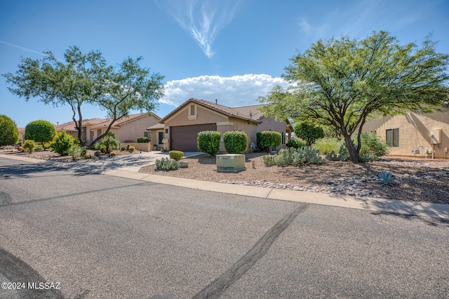 view of front of property featuring a garage