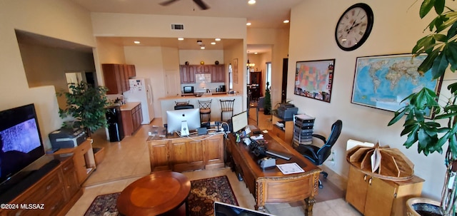 office space featuring ceiling fan and light tile patterned floors