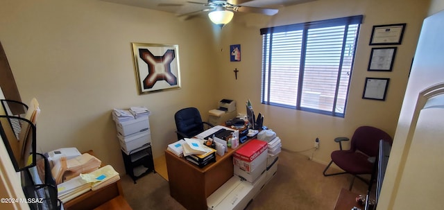 office area featuring ceiling fan and light colored carpet