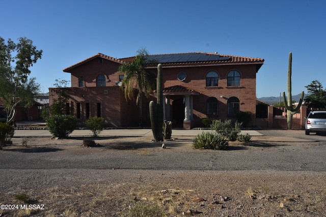 exterior space with solar panels