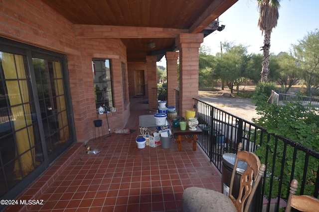 view of patio with a balcony