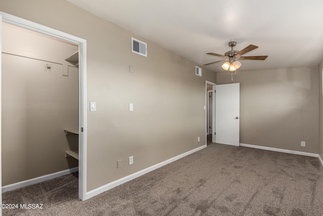 unfurnished bedroom featuring carpet and ceiling fan