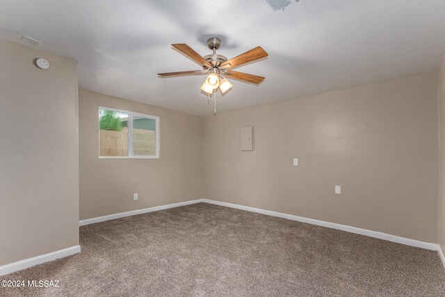 carpeted empty room with ceiling fan