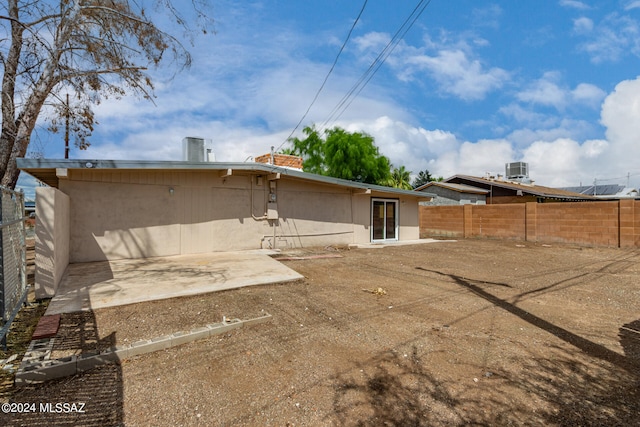 back of property featuring a patio