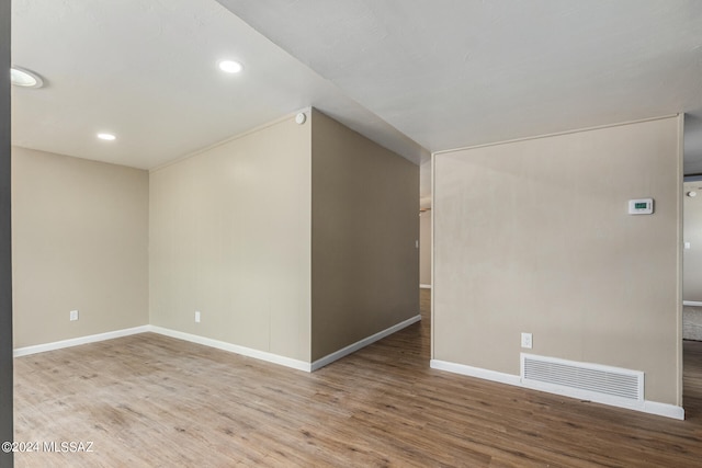 unfurnished room featuring light hardwood / wood-style floors