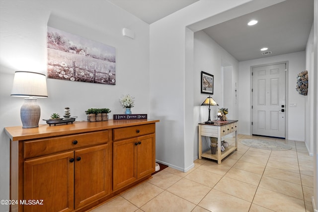 view of tiled foyer entrance