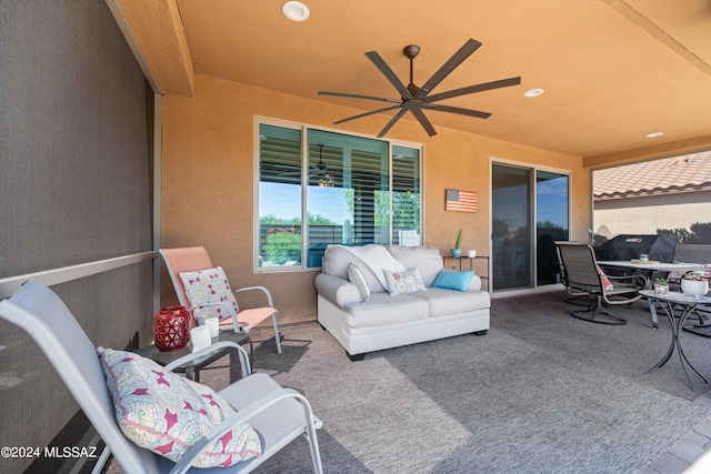 view of patio featuring ceiling fan