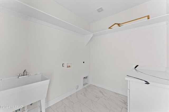 laundry room featuring hookup for an electric dryer, washer hookup, and sink