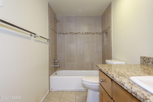 full bathroom featuring tile patterned floors, vanity, toilet, and tub / shower combination