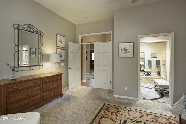 bedroom with light colored carpet