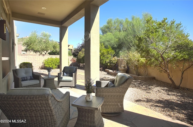 view of patio / terrace with a fenced backyard and outdoor lounge area