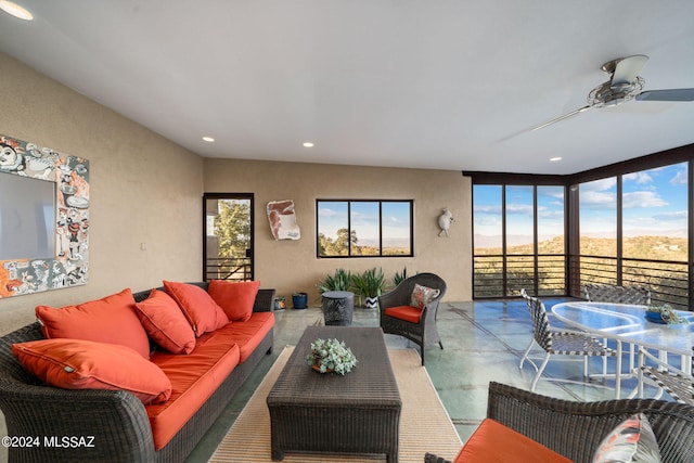 living room with ceiling fan