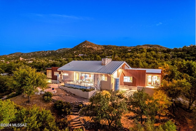 view of front of house with a mountain view