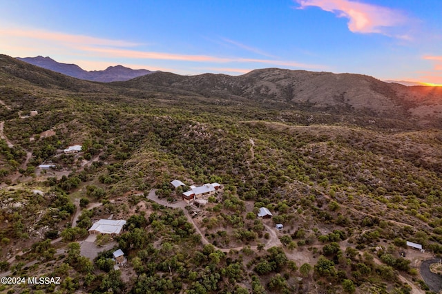 aerial view at dusk with a mountain view