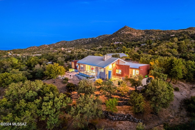 drone / aerial view featuring a mountain view