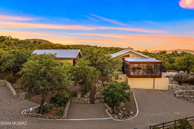 view of front of home featuring a mountain view