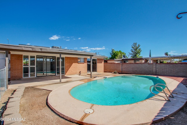 view of pool with a patio