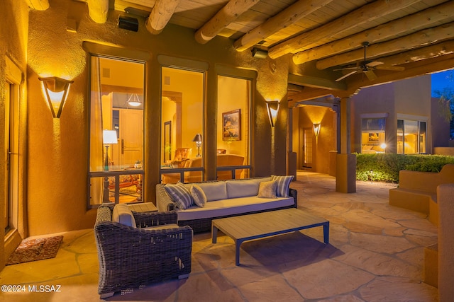 view of patio with ceiling fan and an outdoor hangout area