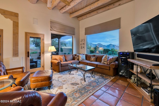 living room with wooden ceiling, beam ceiling, and tile patterned floors