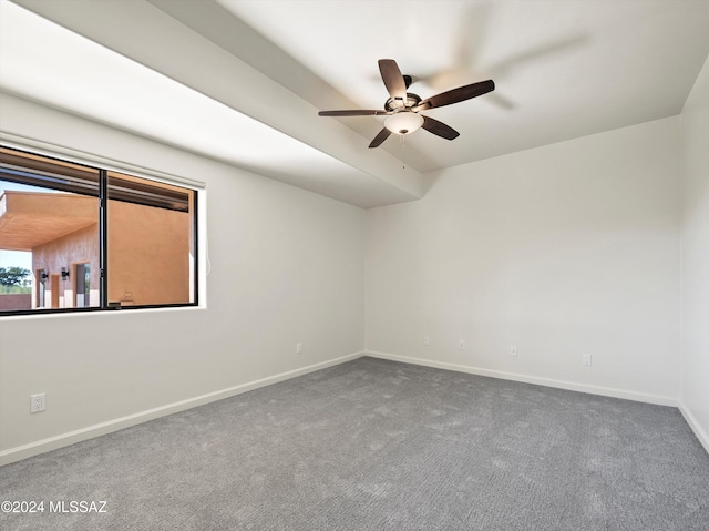 spare room with carpet flooring and ceiling fan