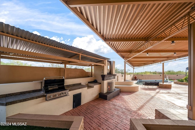 view of patio / terrace featuring a grill and area for grilling