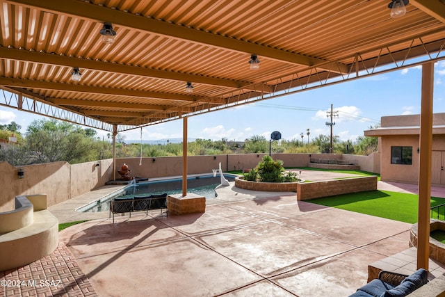 view of patio / terrace featuring a fenced in pool