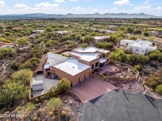 drone / aerial view featuring a mountain view