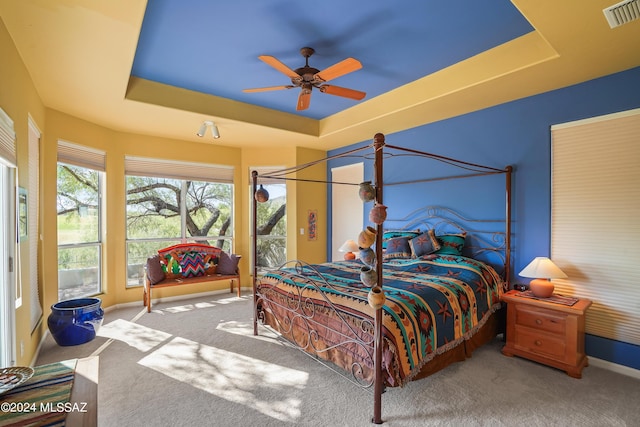 875 S Deer Meadow Loop, Tucson, AZ 85745 - carpeted bedroom with a raised ceiling, baseboards, and a ceiling fan