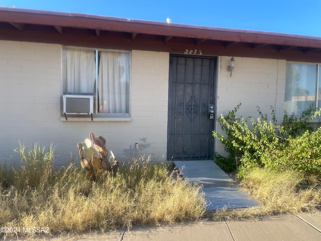 property entrance featuring cooling unit