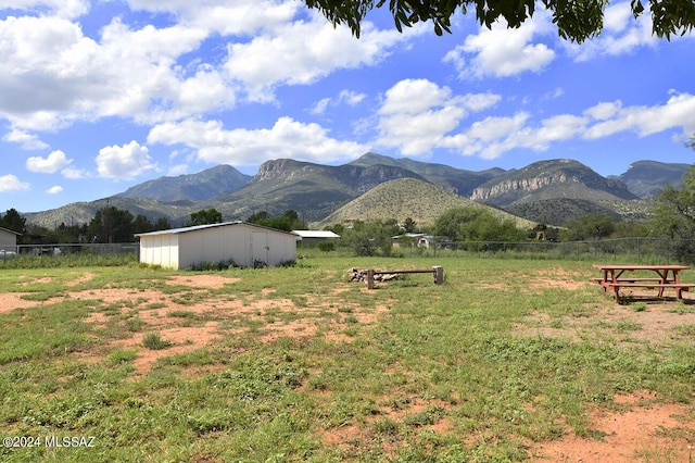 view of mountain feature featuring a rural view