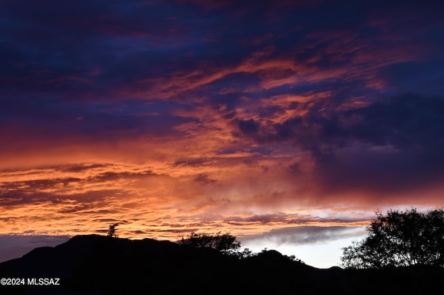 nature at dusk featuring a mountain view