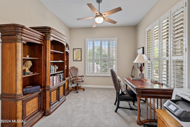 office featuring ceiling fan and light colored carpet