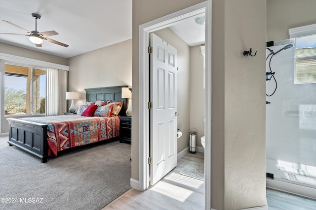 bedroom featuring ceiling fan and light hardwood / wood-style flooring