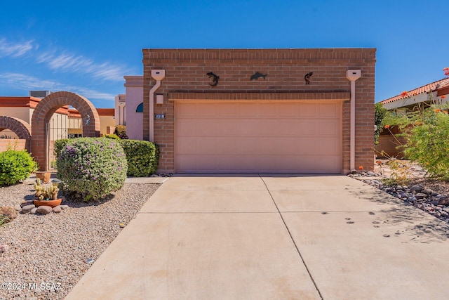 view of front of home with a garage