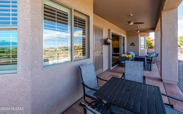 view of patio / terrace featuring ceiling fan