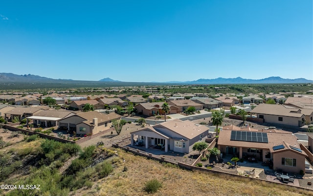 drone / aerial view featuring a mountain view