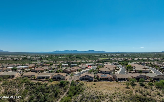 drone / aerial view featuring a mountain view