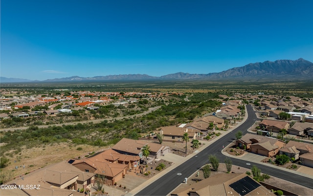 drone / aerial view featuring a mountain view