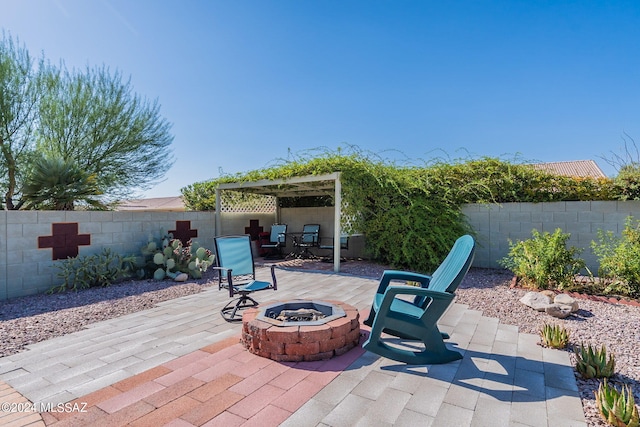 mediterranean / spanish home with a garage, concrete driveway, a tile roof, and stucco siding